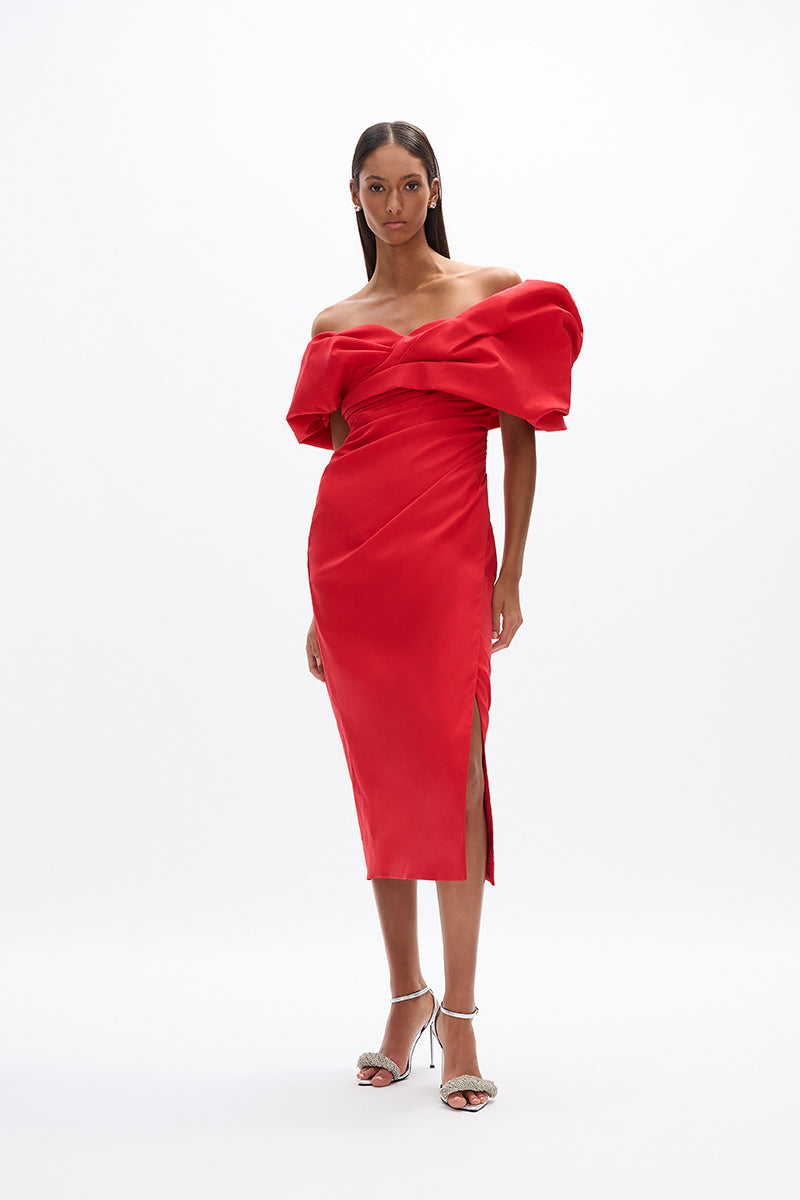 Gia Dress: red mid-length cocktail dress featuring voluminous off-the-shoulder detail with side split. 