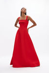 Sera Gown: extravagant red formal gown featuring square neckline and voluminous flowing skirt, perfect for evening events.