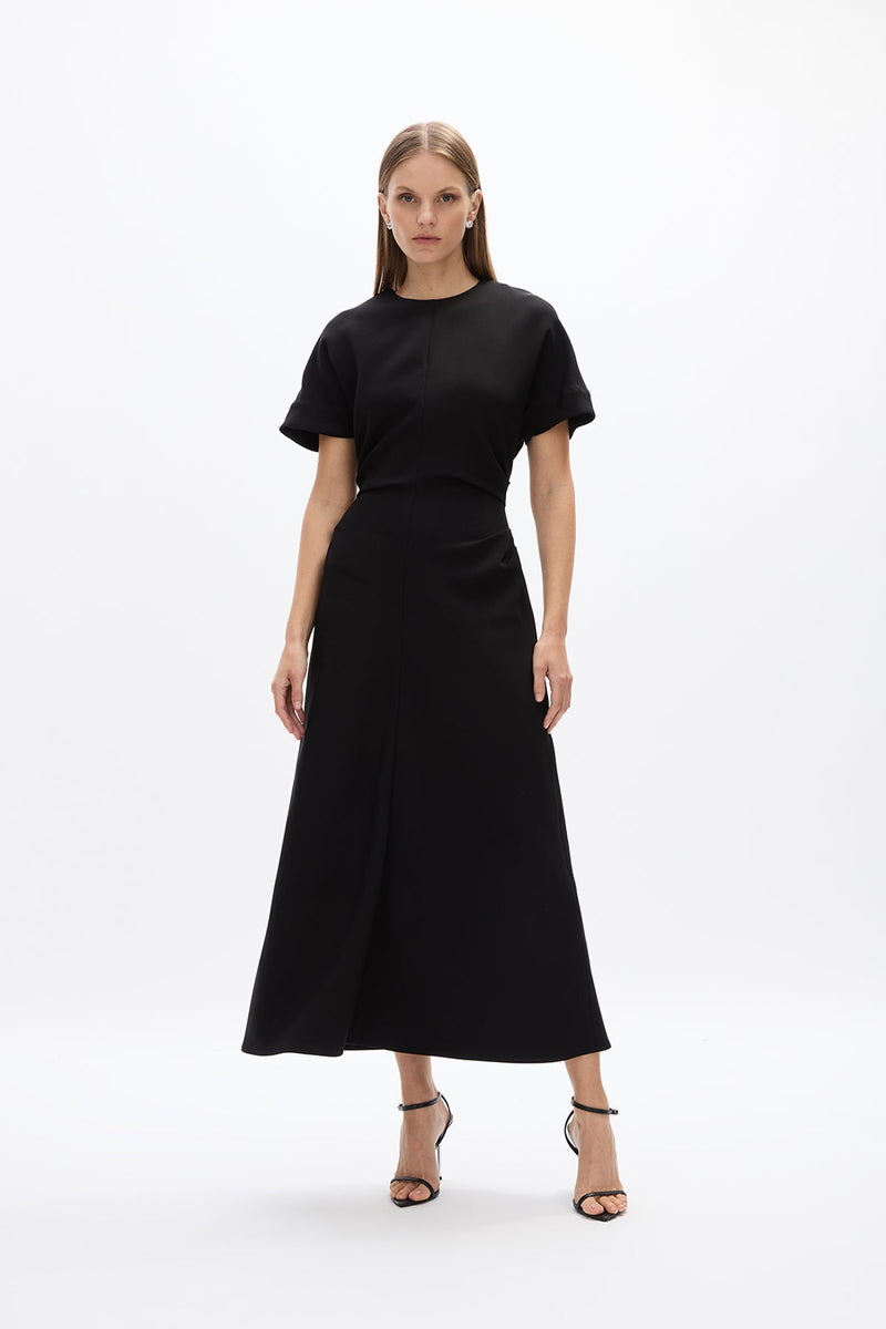 Orion Dress: chic black mid-length dress with short sleeve and flowing skirt, perfect for day to night wear.