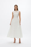 Sophia Dress: sophisticated white cocktail dress featuring fitted waist and voluminous skirt, perfect for pre-wedding events.