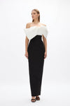 Kace Gown: sophisticated black and white formal gown featuring off-the-shoulder bow detail and side split. 