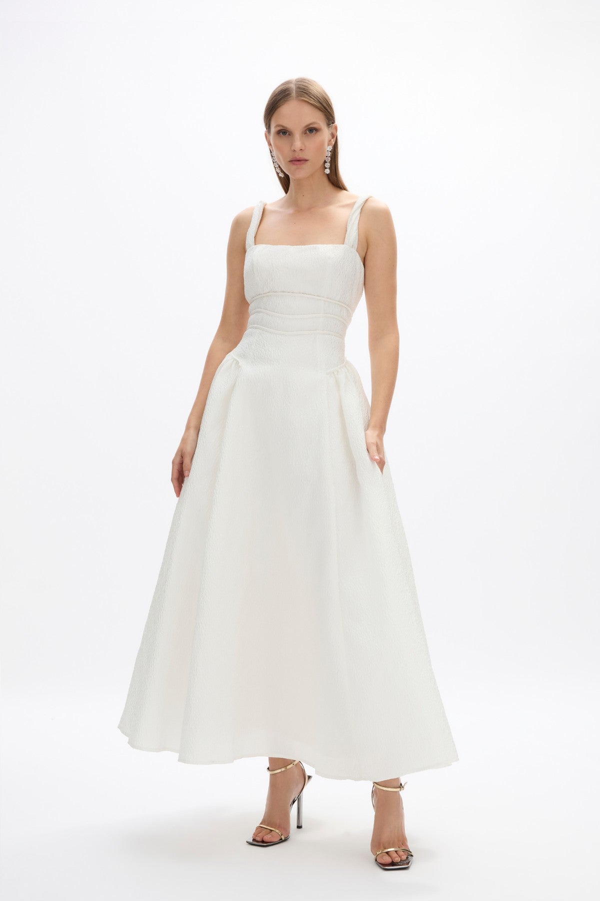 Sophia Strap Dress: sophisticated white cocktail dress featuring fitted waist, square neckline and voluminous skirt, perfect for pre-wedding events.