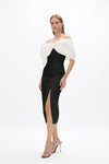 Kace Dress: sophisticated black and white cocktail dress featuring off-the-shoulder bow detail and side split. 